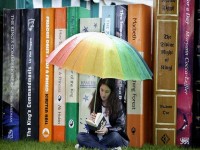 Teenage Girl Reading at Hay-on-Wye Book Festival